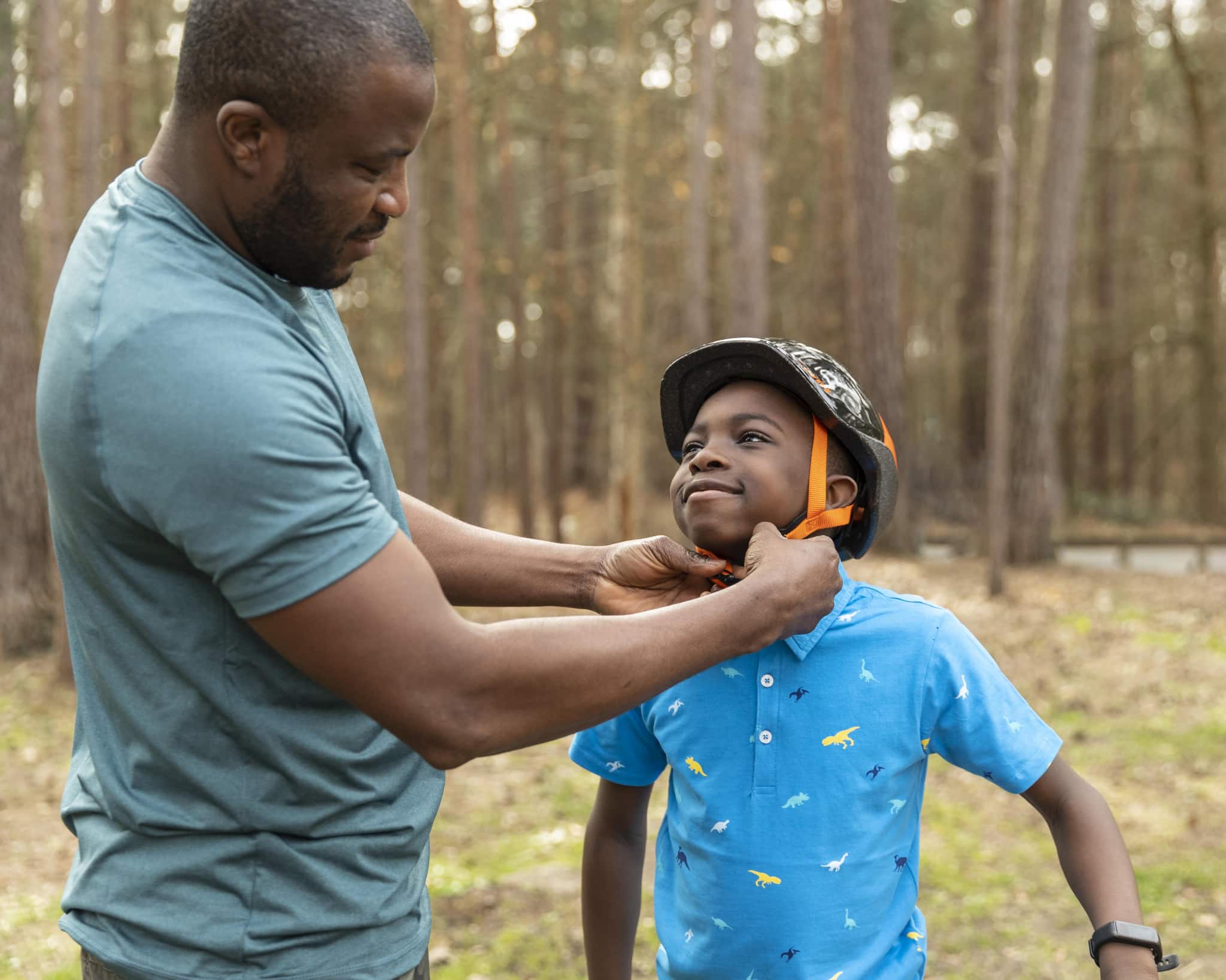 father-preparing-his-kid-bicycle-ride