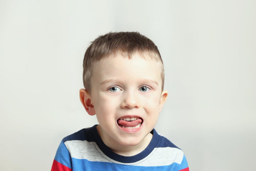 boy-kid-performs-articulation-exercises-tongue-correct-pronunciation-vocals-dental-concept-speech-therapy