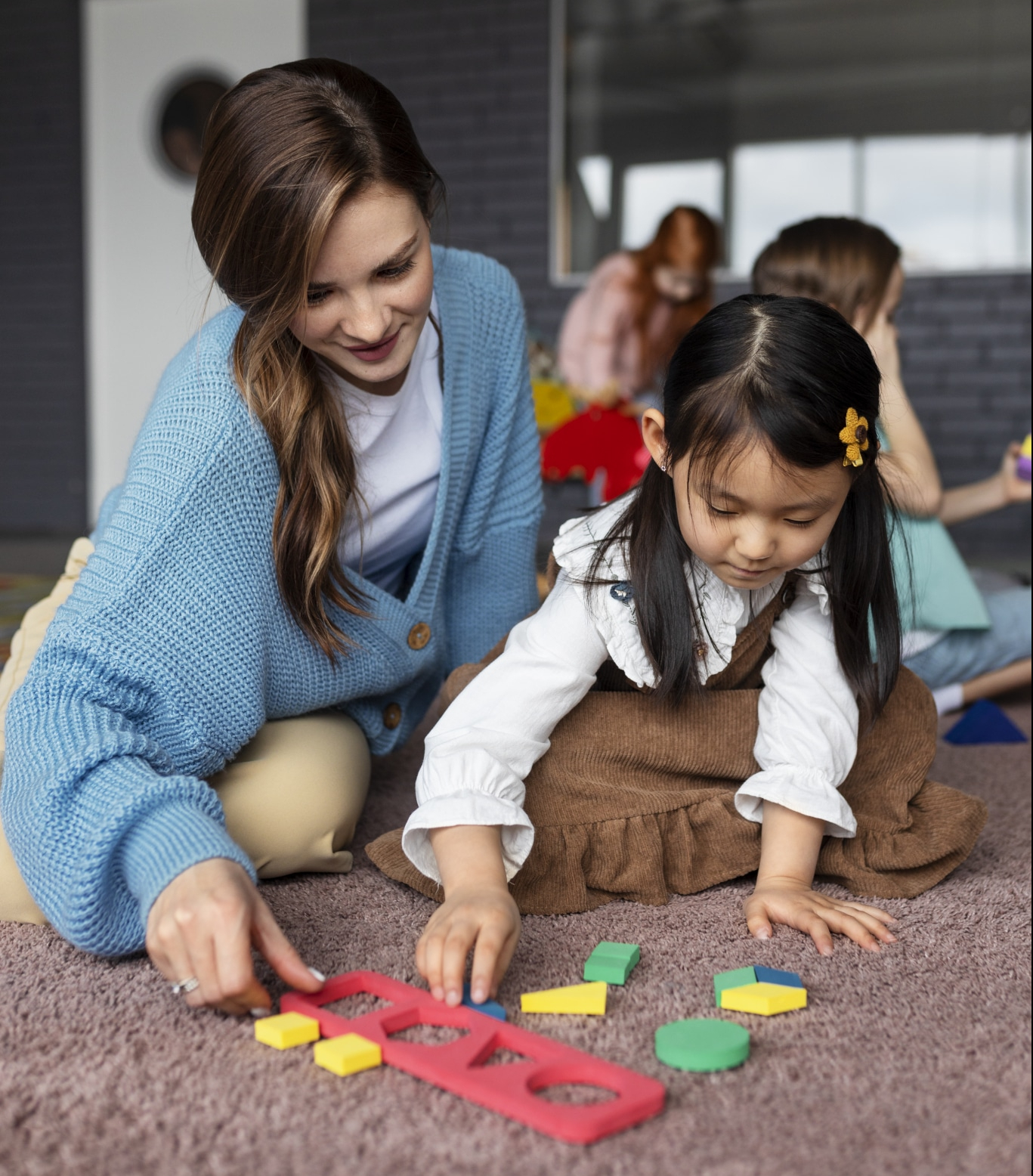 full-shot-teacher-helping-girl-learn